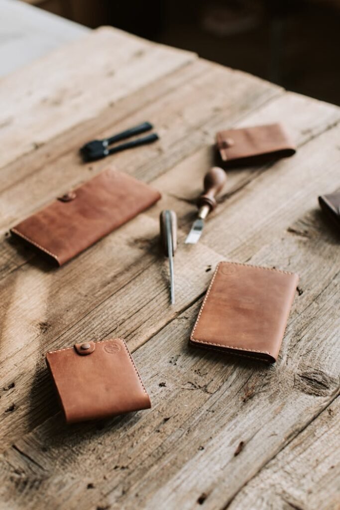 A Close-Up Shot of Leather Products and Leather Craft Tools